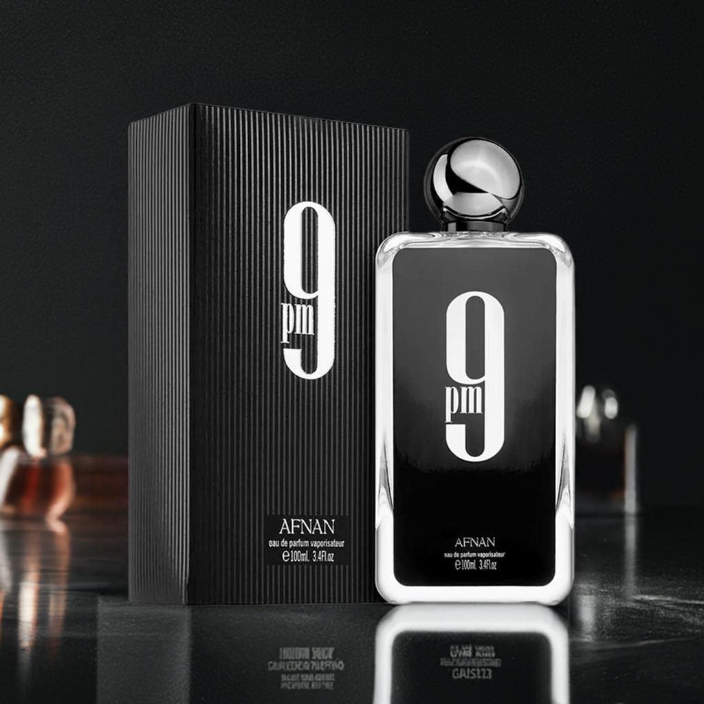 Afnan 9pm perfume bottle with black and red gradient design on a clean background